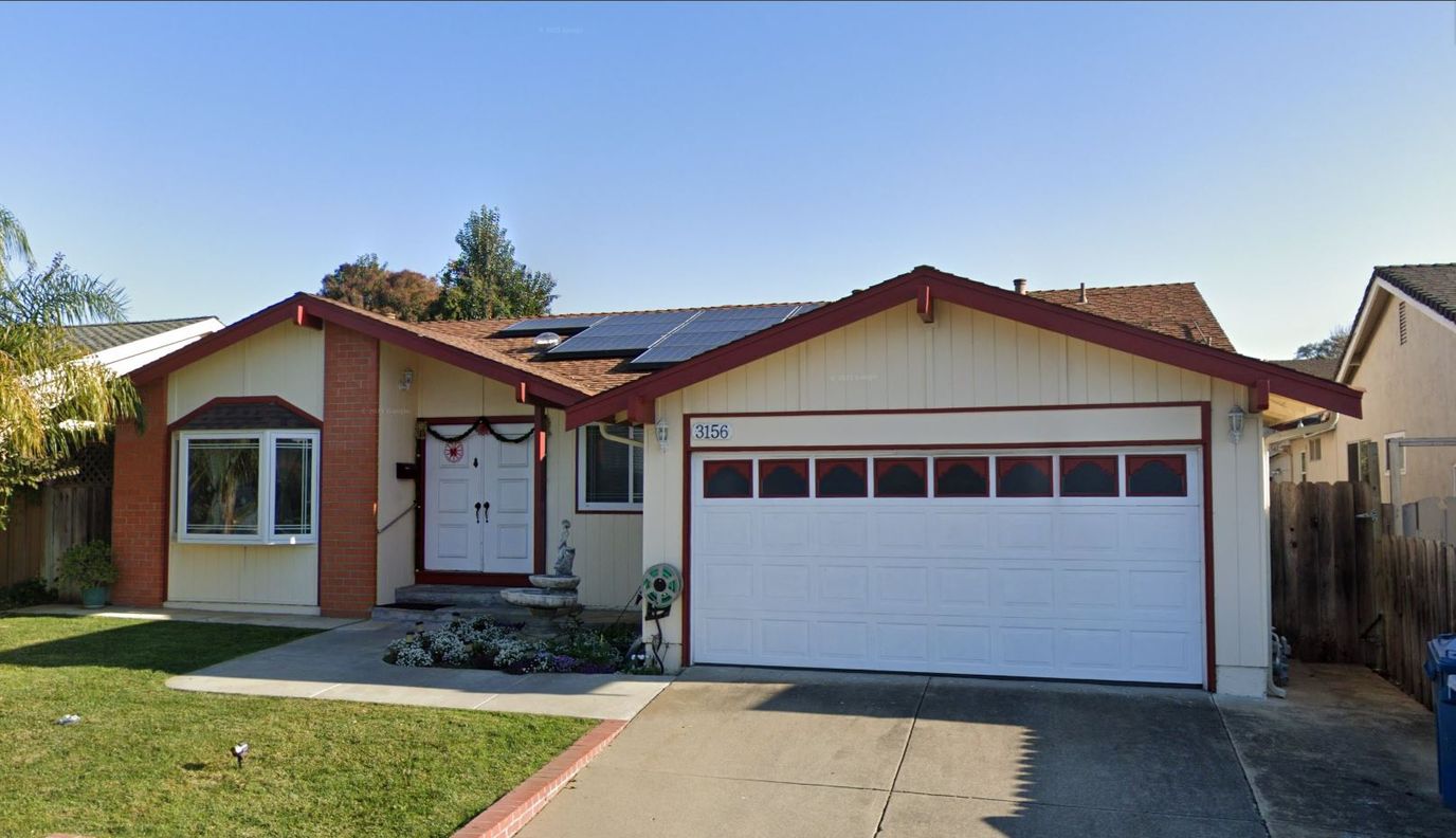 Exterior view of a residential building with a garage