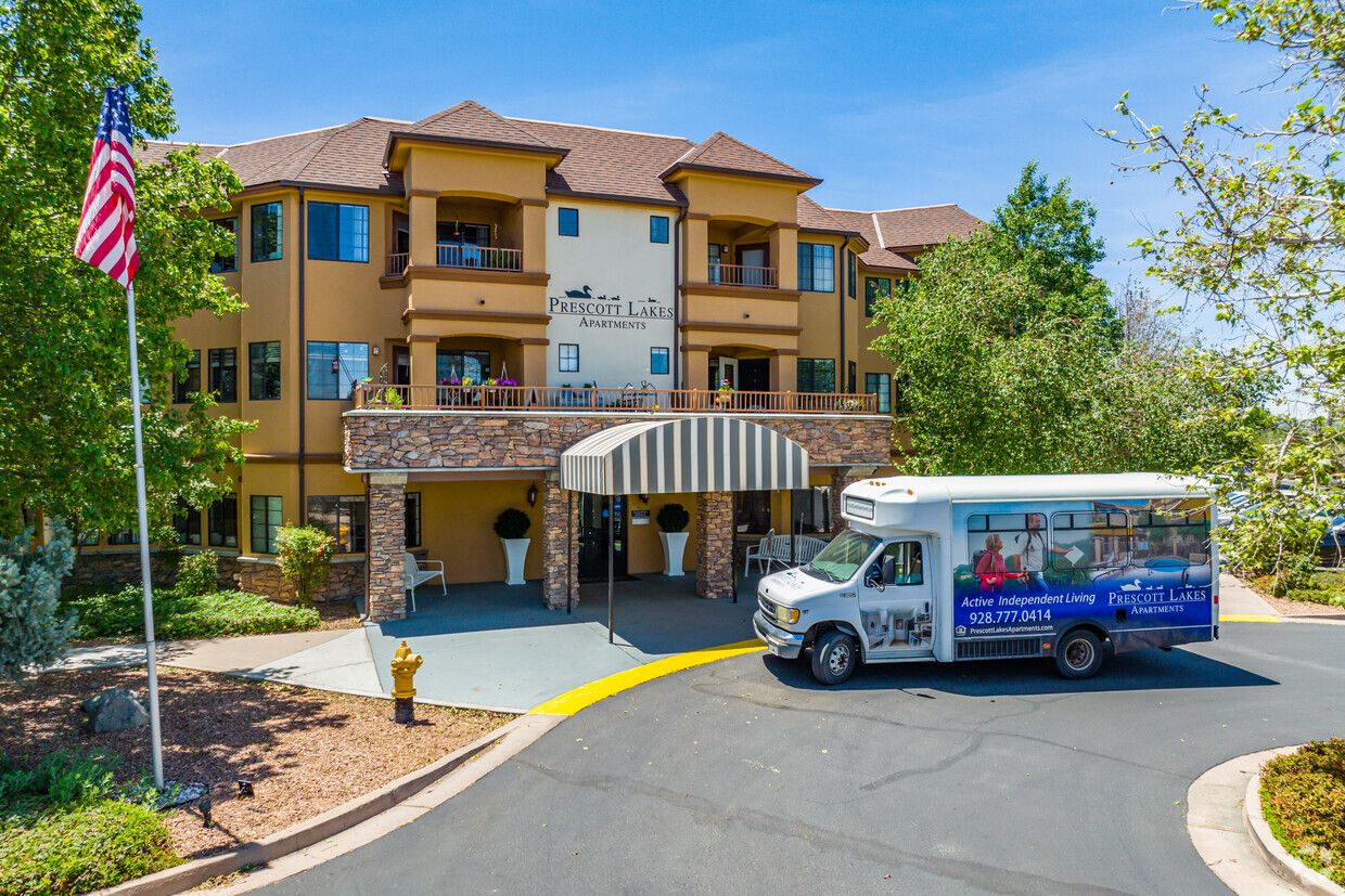 Exterior view of Prescott Lakes Senior Apartments with facility bus