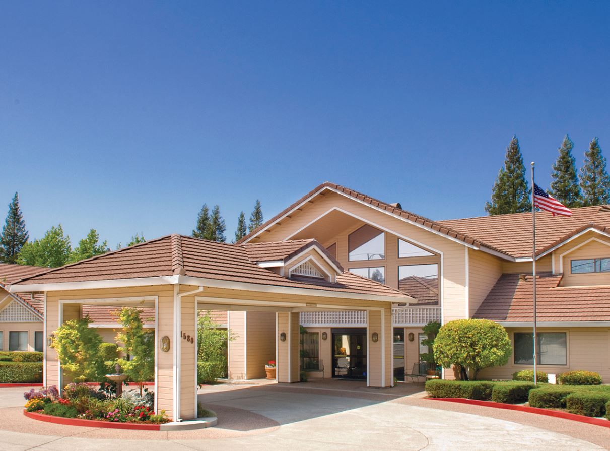 Exterior view of a senior living facility entrance