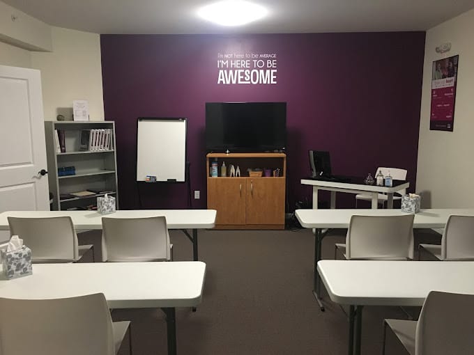 Interior activity room with seating and motivational wall art