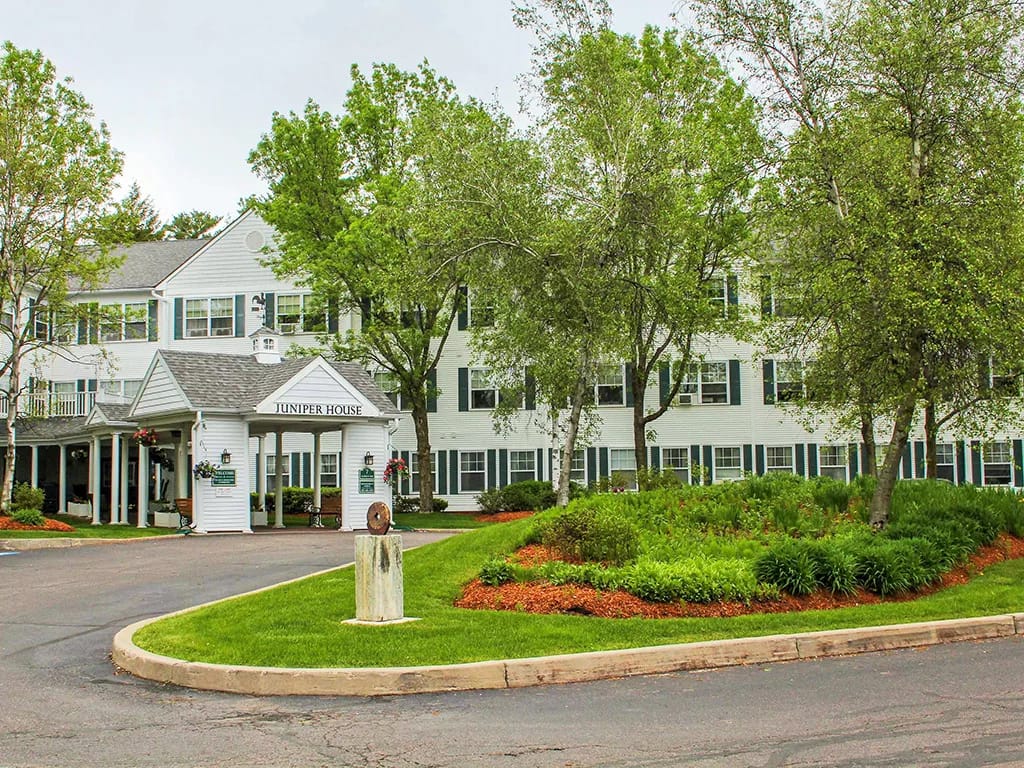 Exterior view of Juniper House with landscaped gardens