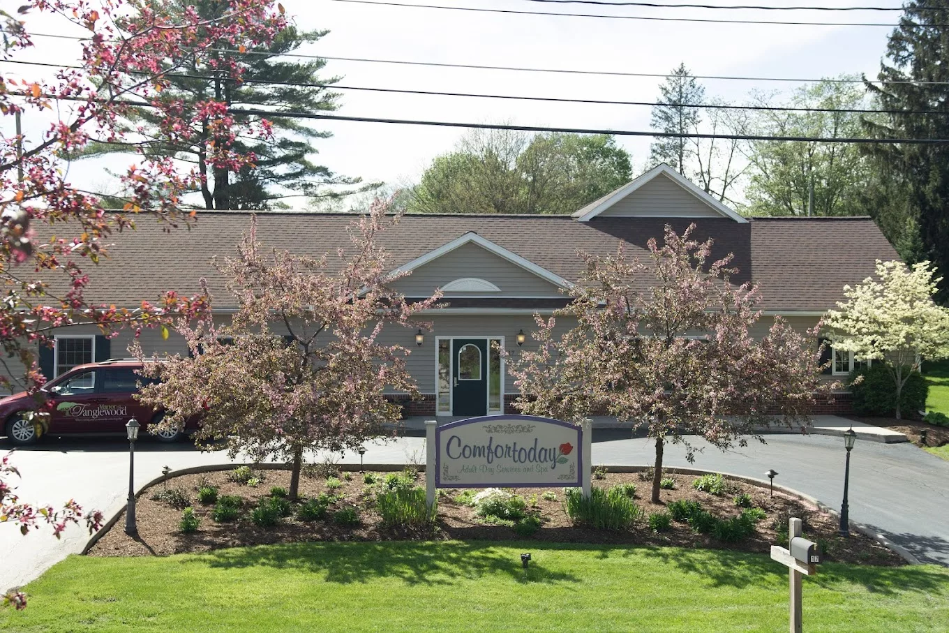 Exterior view of Comfort Today facility with flowers