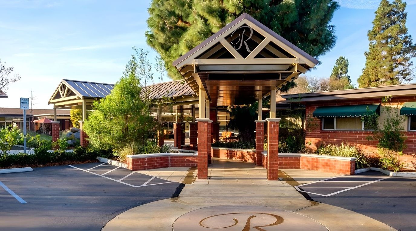 Entrance area with covered walkway leading to the building