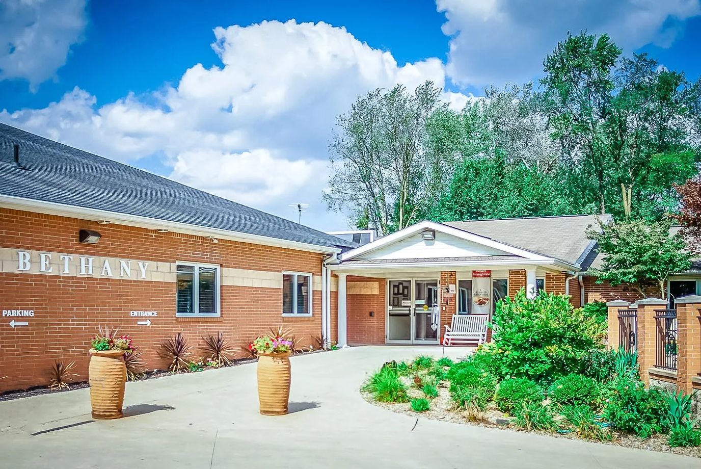 Exterior view of the Bethany facility entrance with landscaping