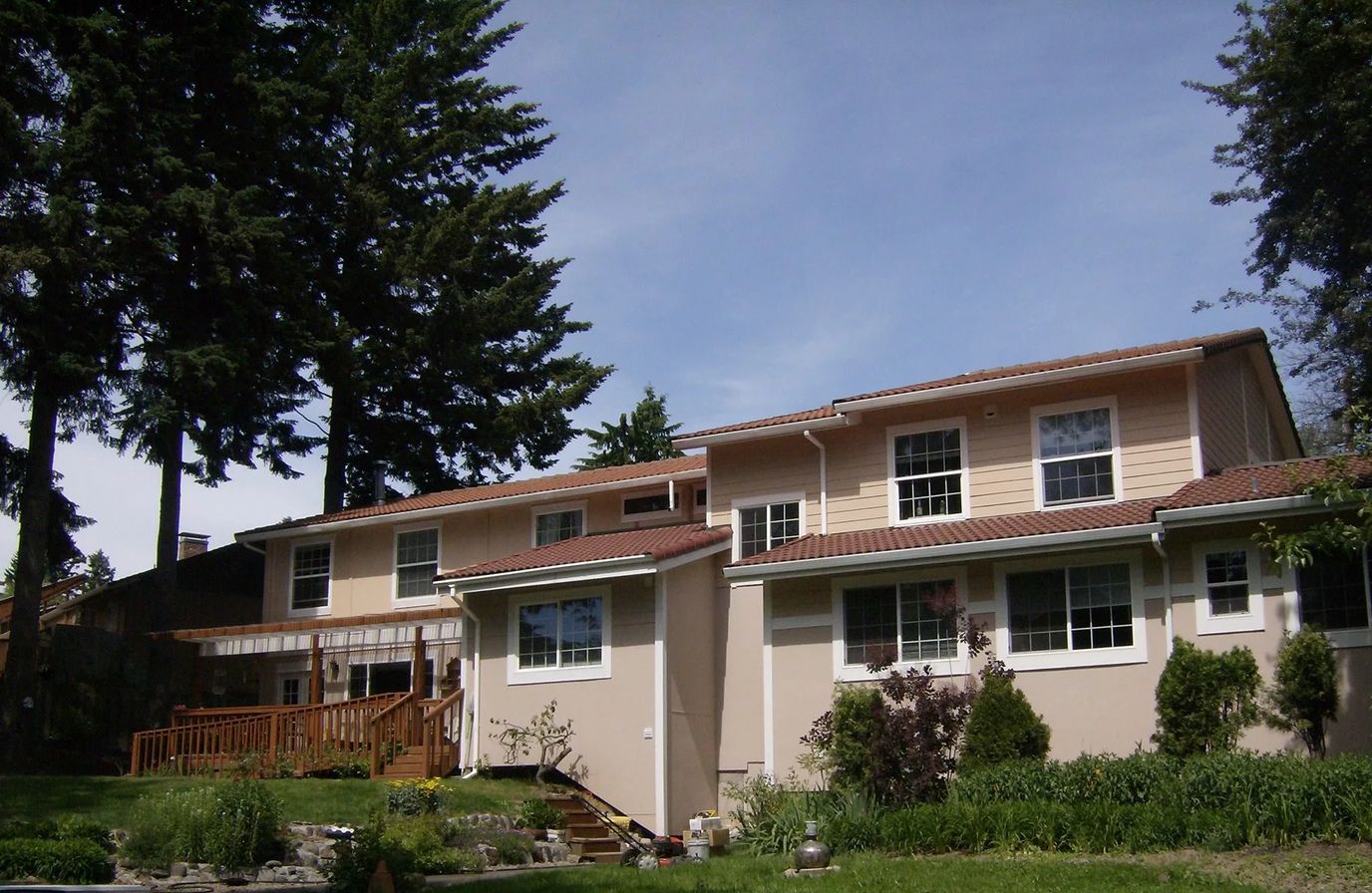 Exterior view of a senior living facility with landscaping
