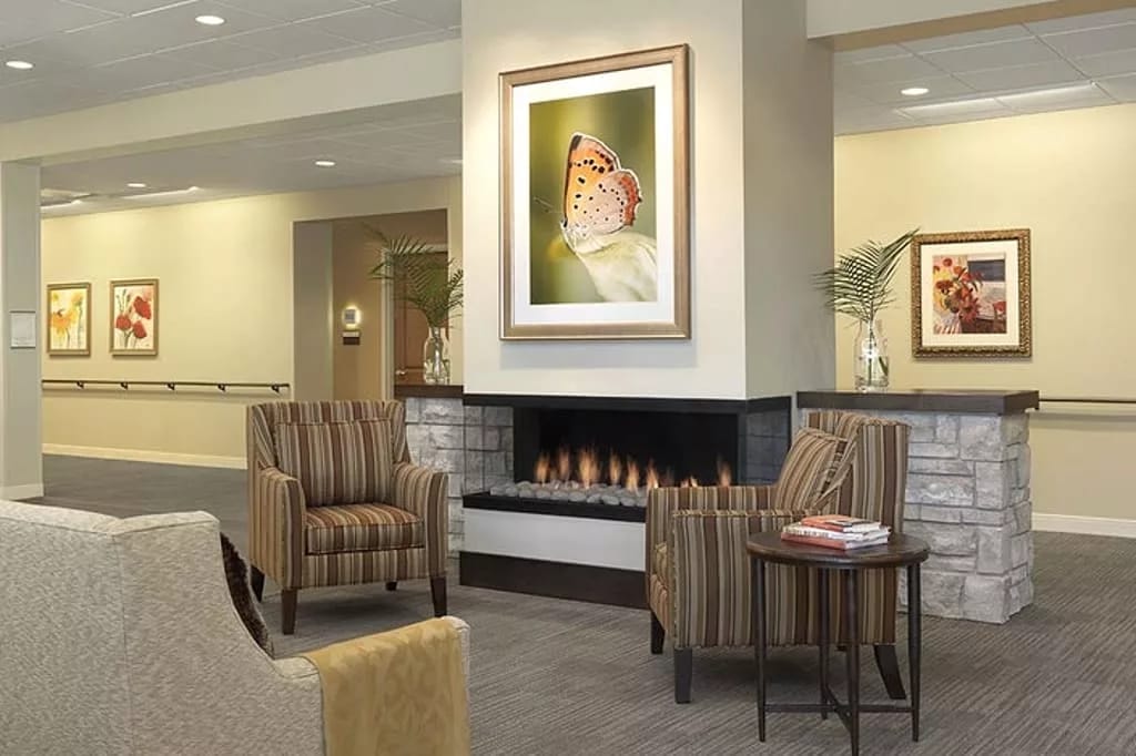 Interior view of a cozy lounge area with a fireplace