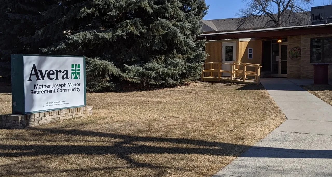 Exterior view of Avera Mother Joseph Manor with sign