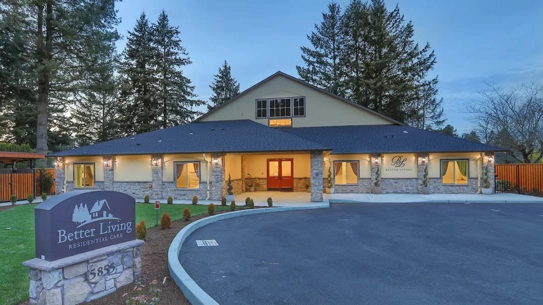 Exterior view of a senior living facility with landscaped entrance