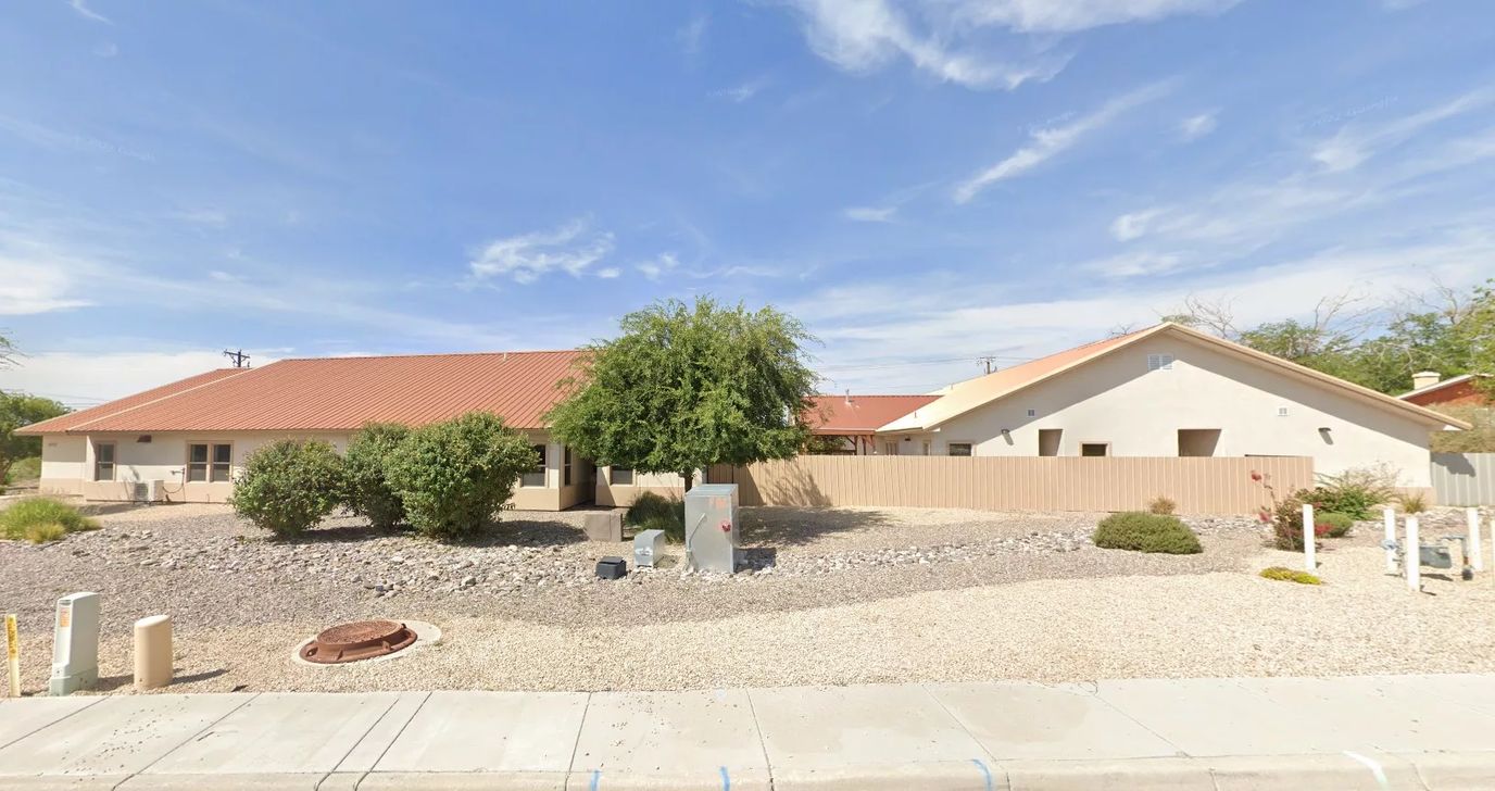 Exterior view of the assisted living facility with landscaping