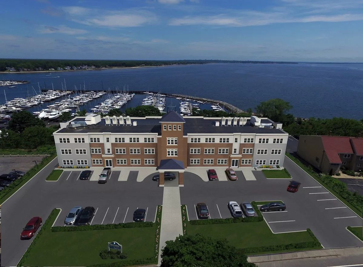 Aerial view of a senior living facility by the bay