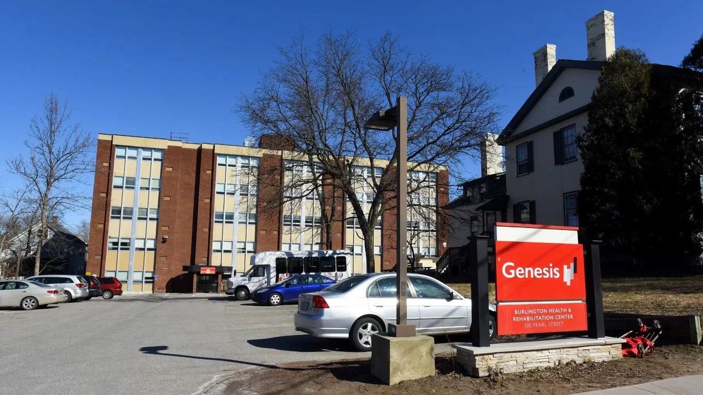 Exterior view of Burlington Health & Rehabilitation Center with signage
