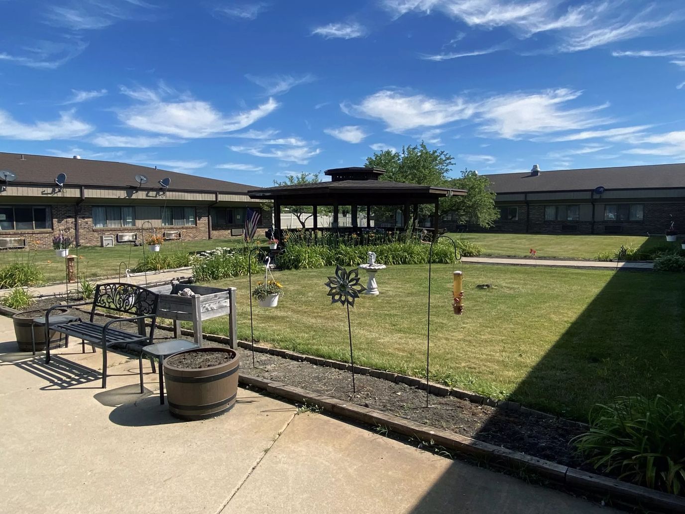 Outdoor garden with seating and pavilion