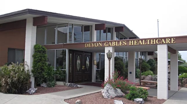 Exterior view of Devon Gables Healthcare building entrance