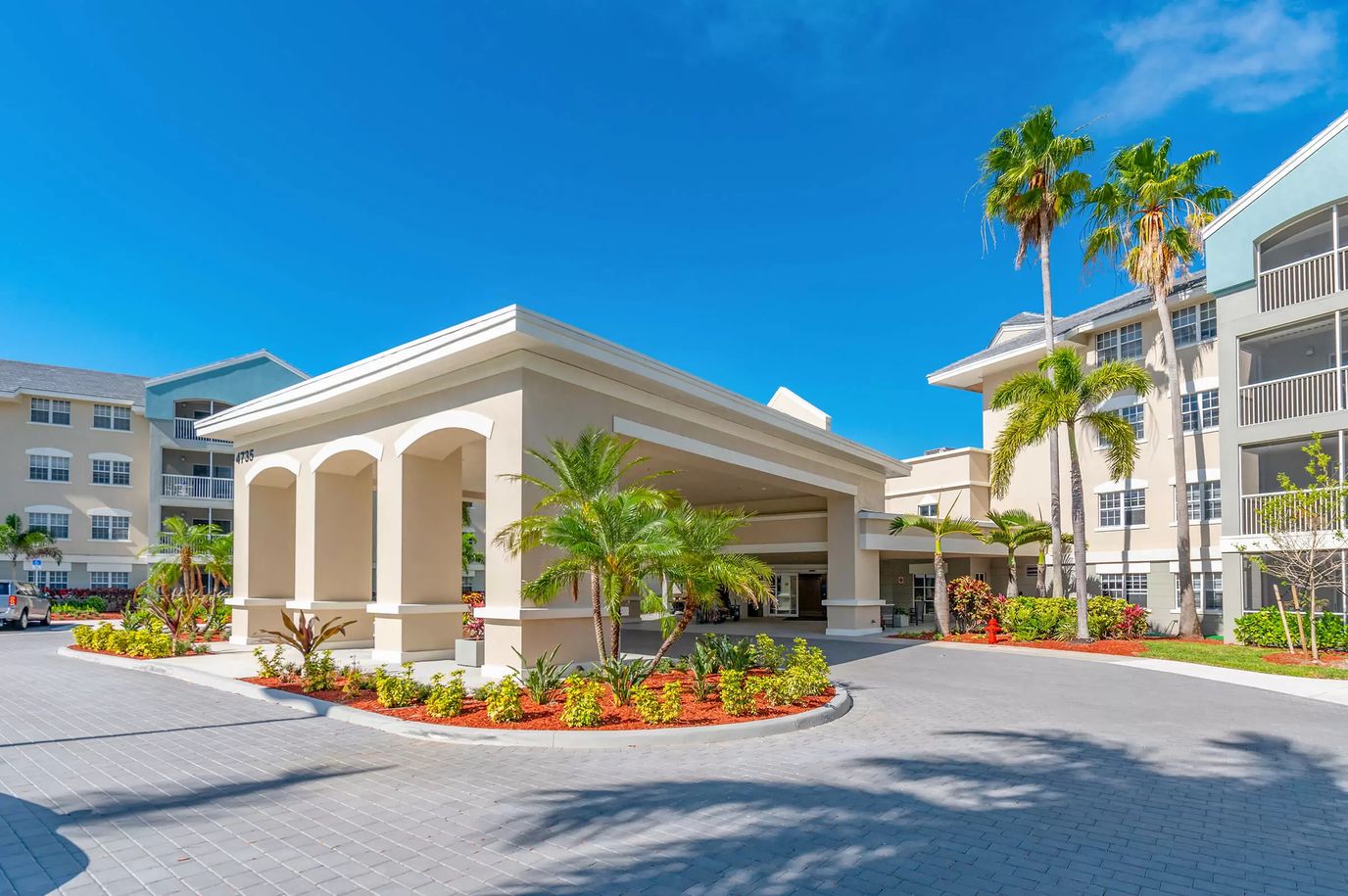 Entrance of the assisted living facility with landscaped area