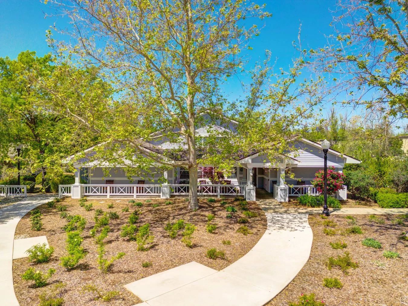 Exterior view of Elk Grove Park facility with gardens