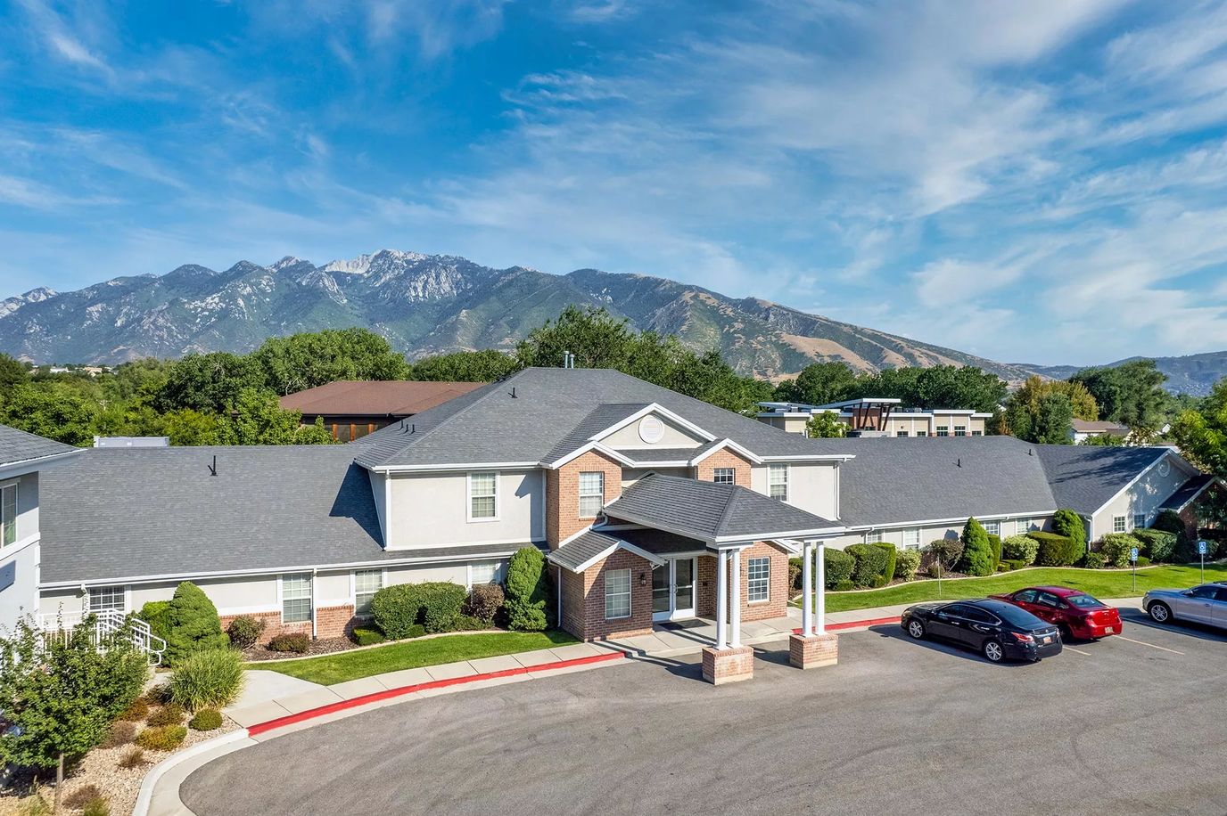 Exterior view of Escalante at Draper with mountains in background