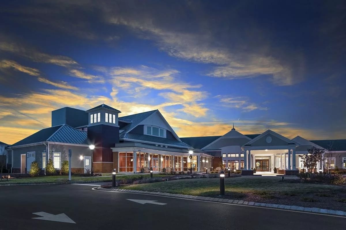 Exterior view of Fellowship Village at sunset
