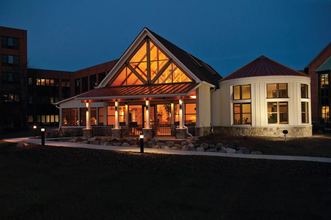 Exterior view of Glacier Hills at dusk with lighting