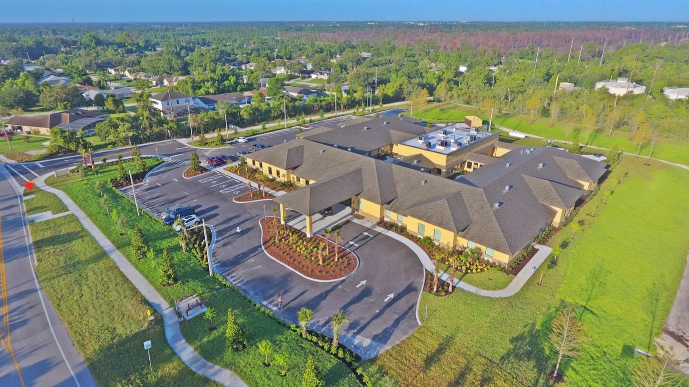 Aerial view of the Gold Choice Deltona facility with landscaped grounds