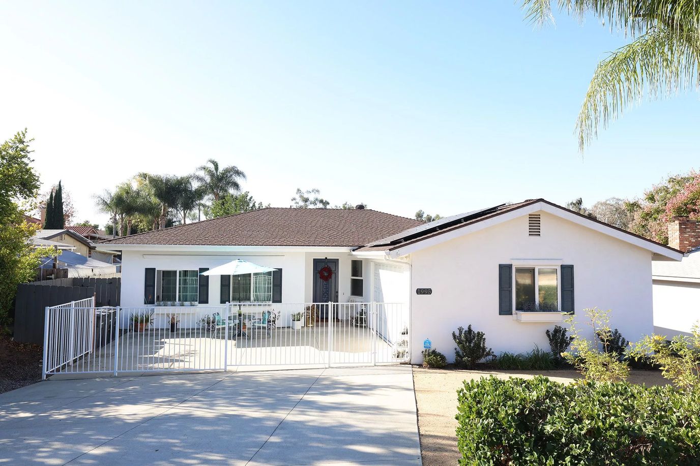 Exterior view of Golden Sunset Villa with patio and garden