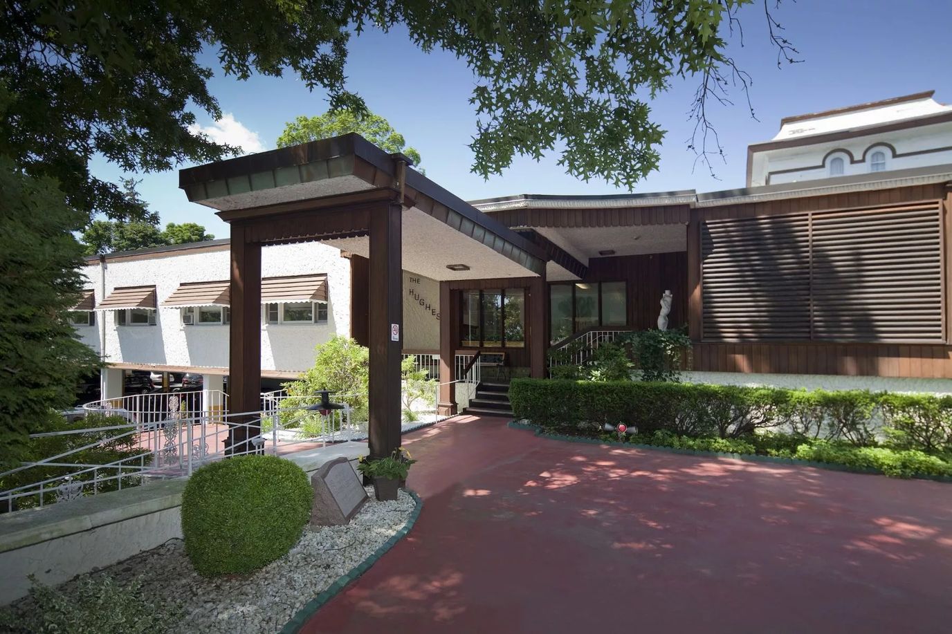 Exterior view of Hughes Health and Rehabilitation entrance