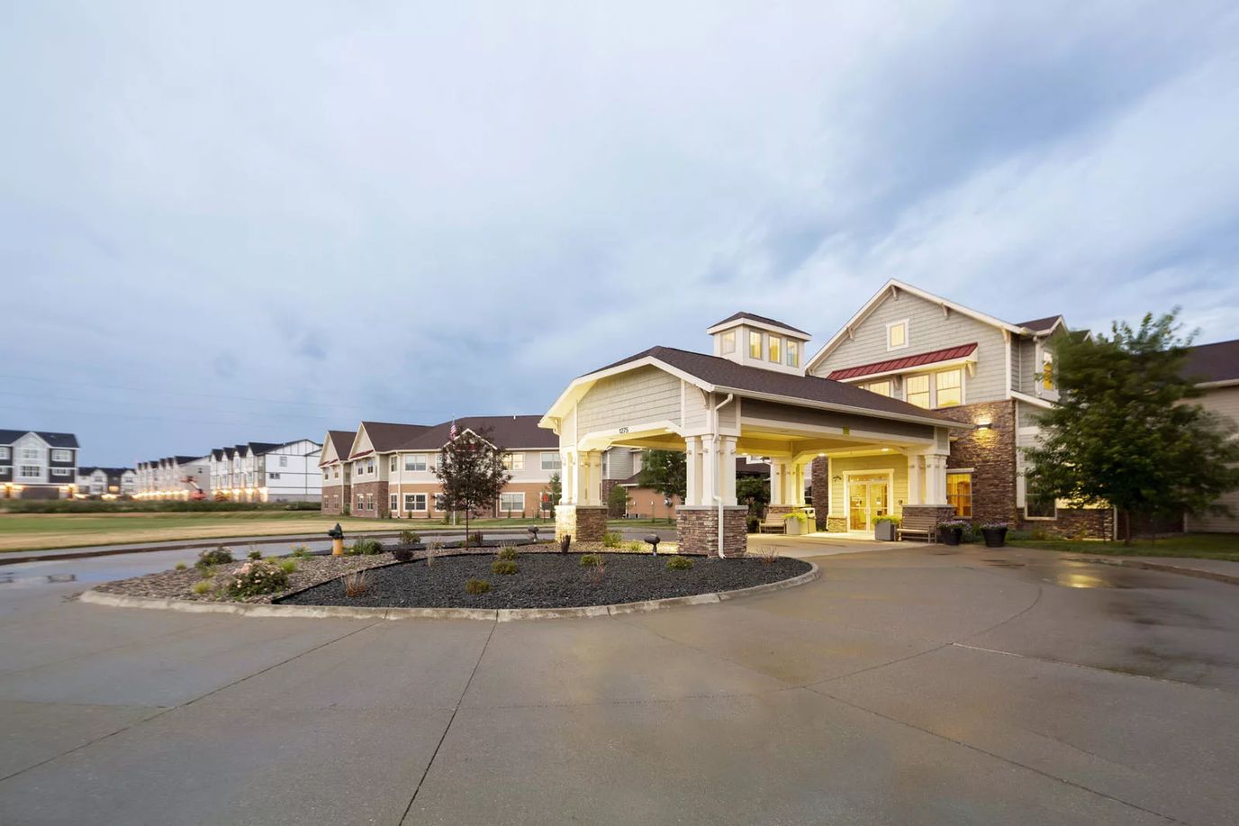 Exterior view of the facility entrance at dusk