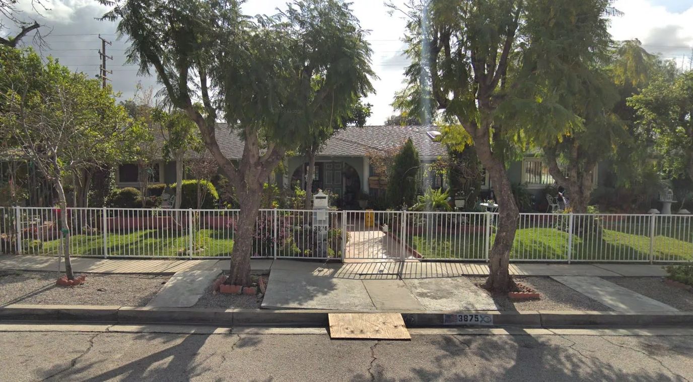 Exterior view of a residential facility with landscaping