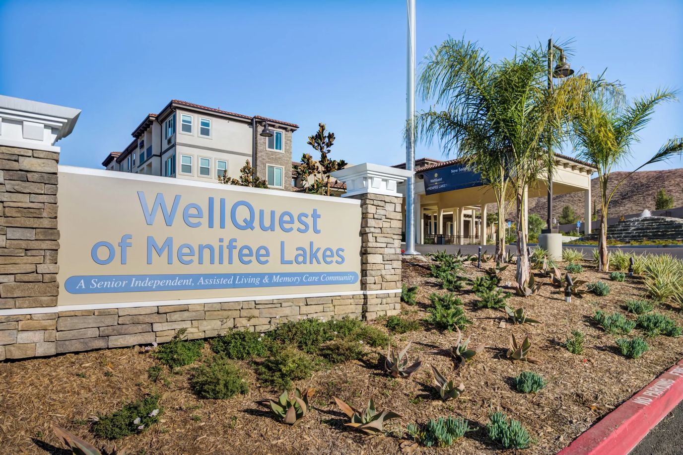 Exterior view of WellQuest of Menifee Lakes community signage