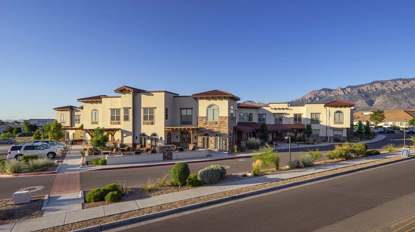 Exterior view of MorningStar Assisted Living facility with landscaping