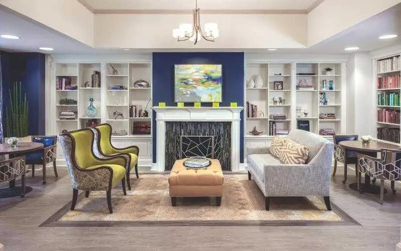 Cozy common area with comfortable seating and artwork