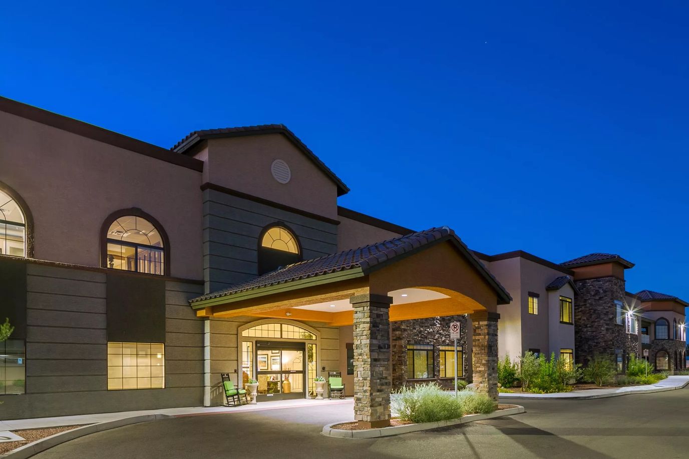 Exterior view of Orchard Pointe at Arrowhead at dusk