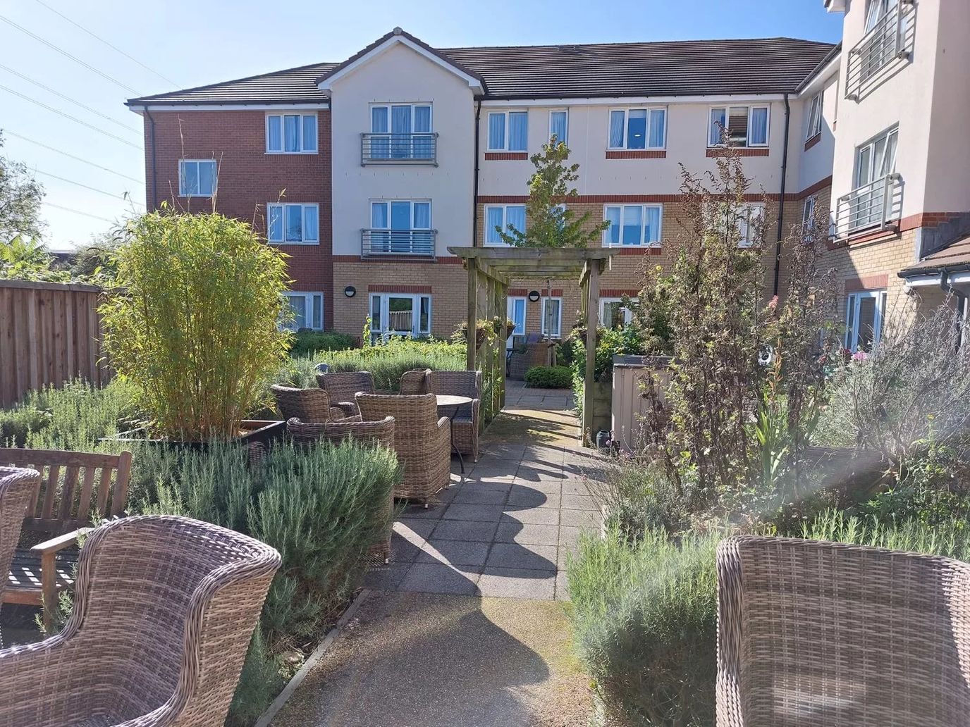 Garden area with seating outside the care home