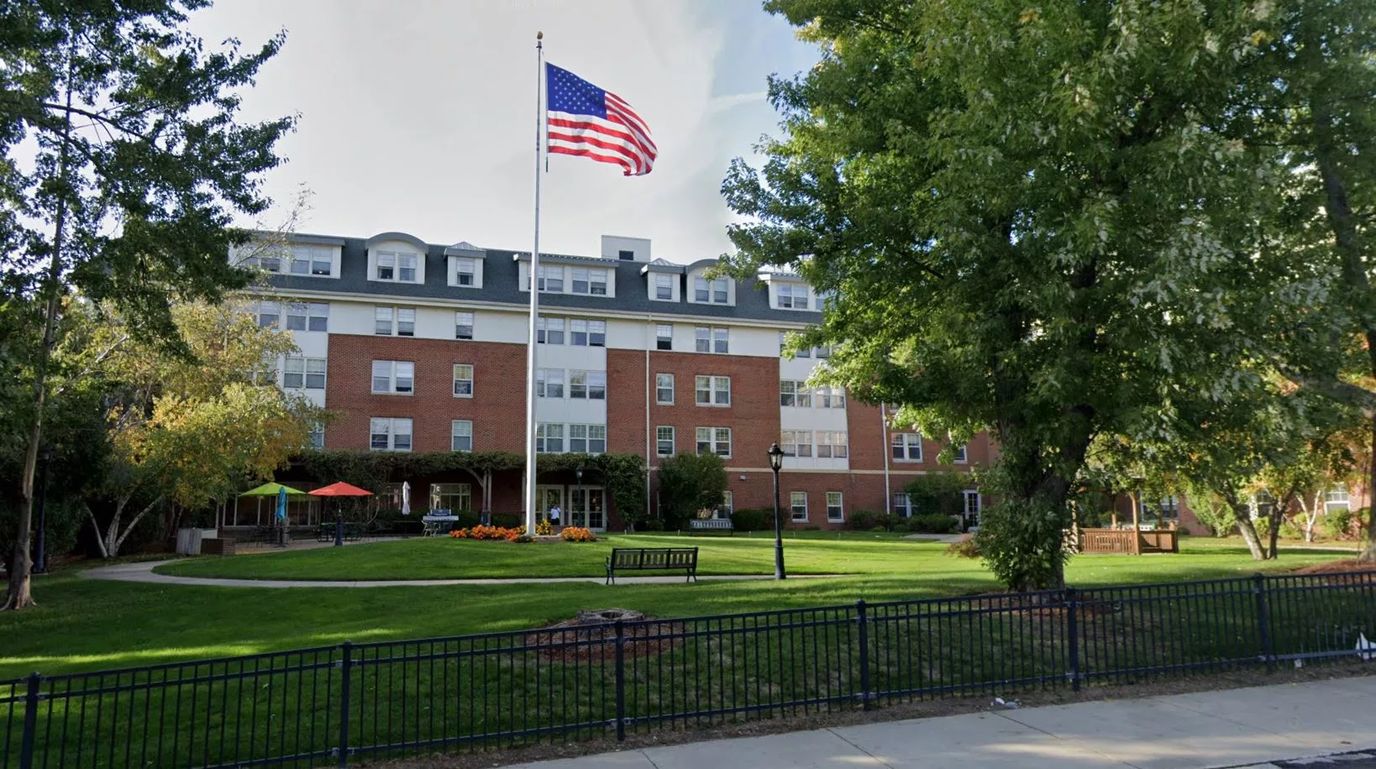 Exterior view of Providence House with American flag