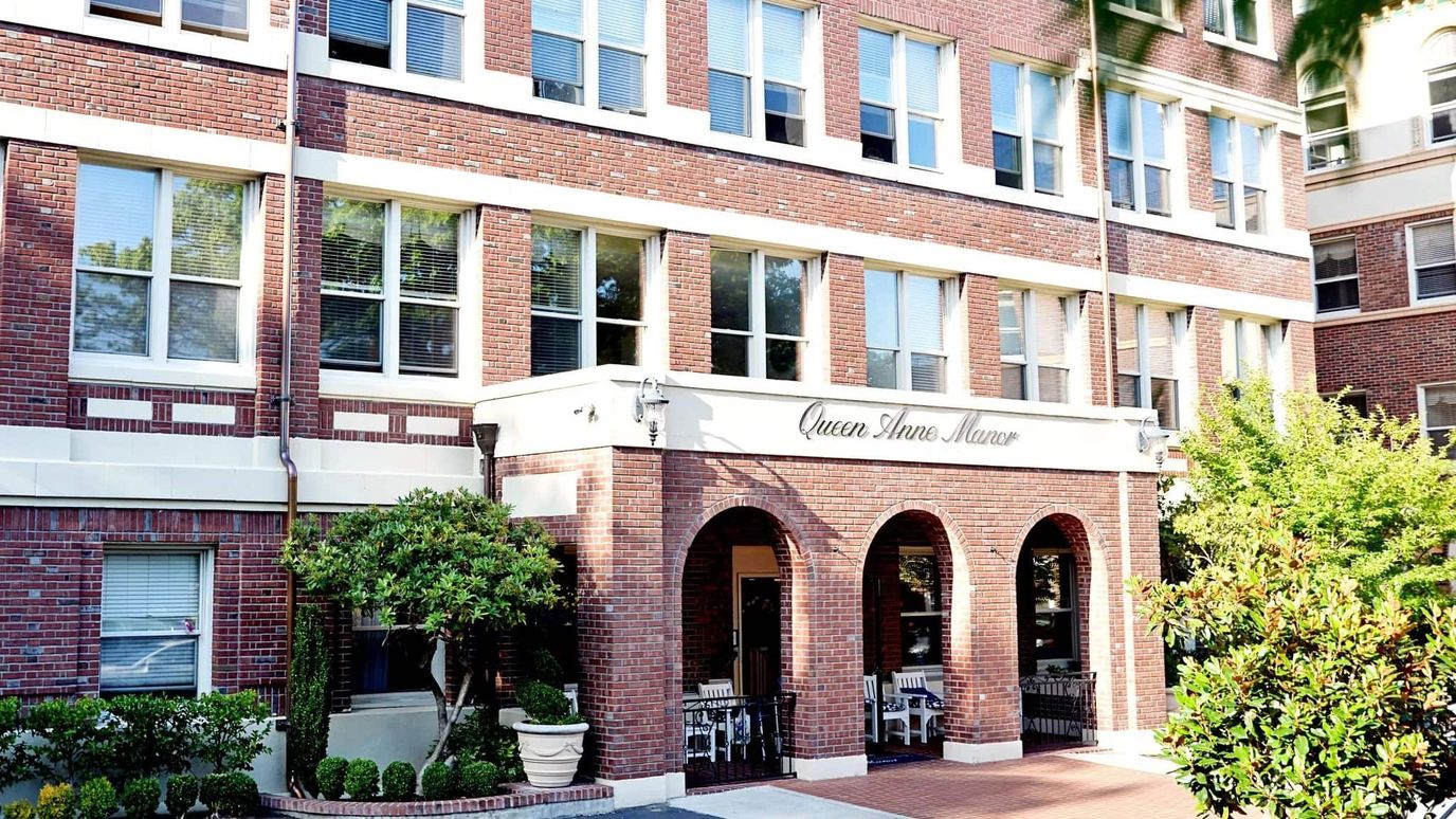 Exterior view of Queen Anne Manor building entrance