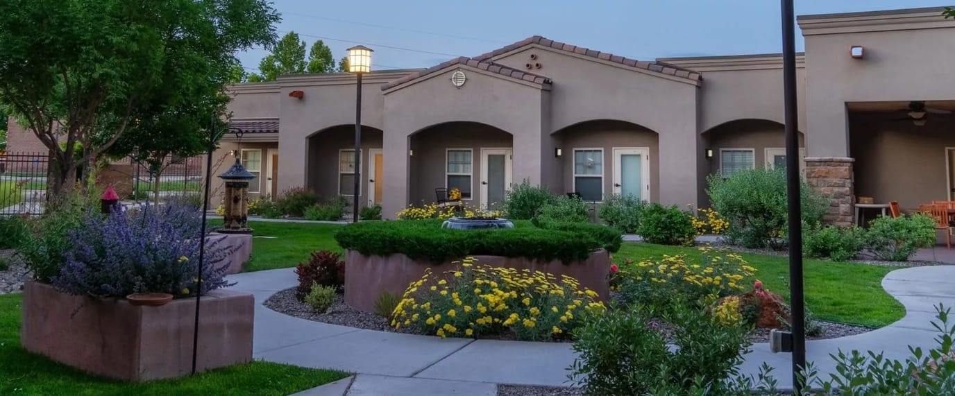 Outdoor garden area with flower beds and pathways