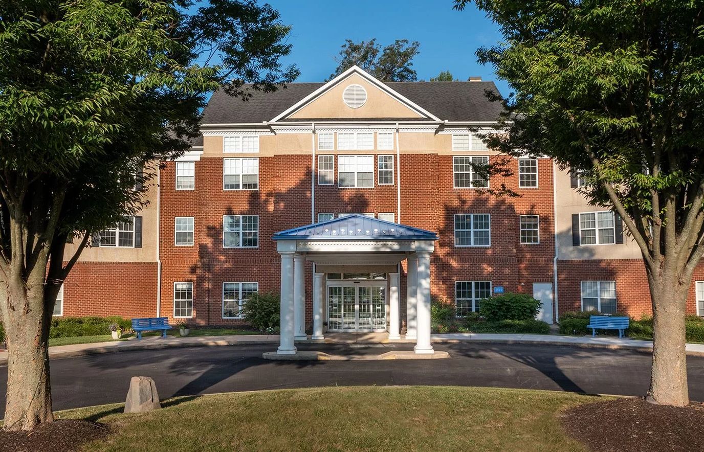 Exterior view of Rockland Place with entrance and landscaping