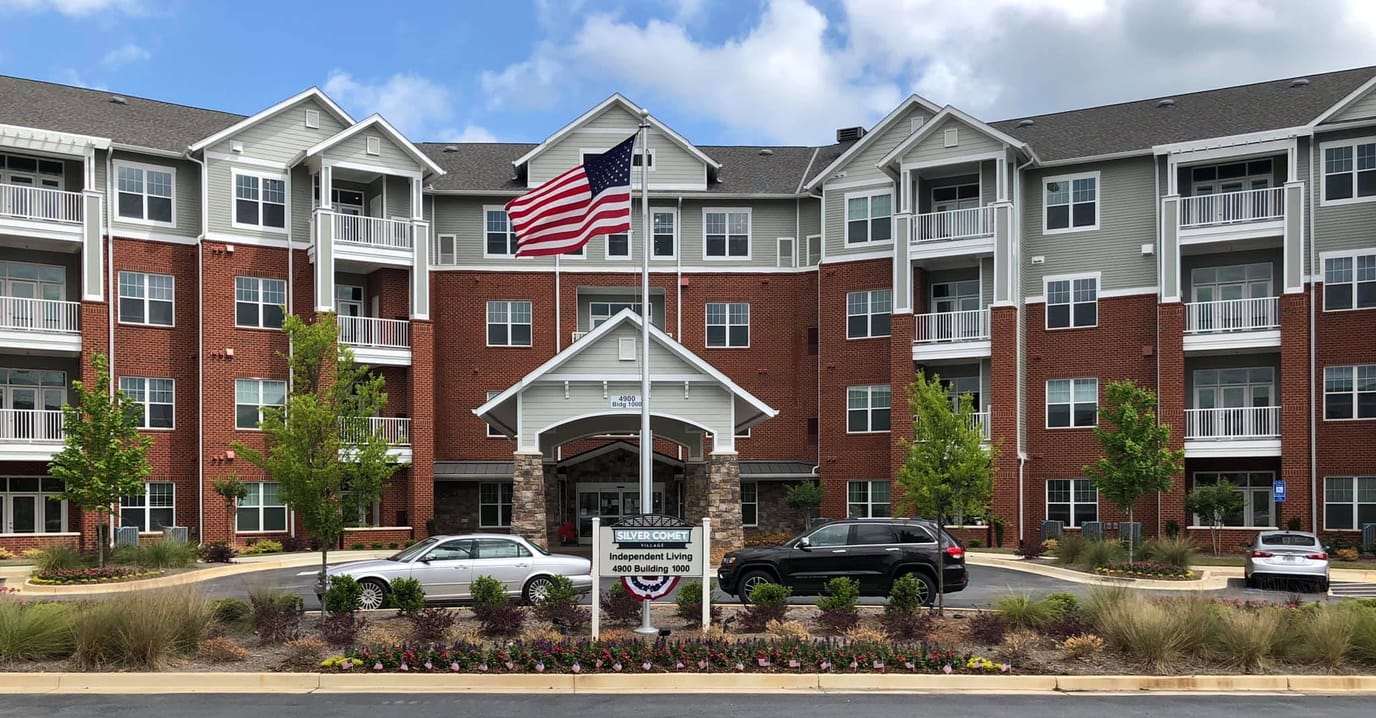 Exterior view of Silver Comet Village with American flag