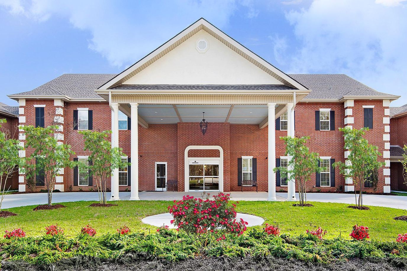 Exterior view of Summerfield facility with landscaping
