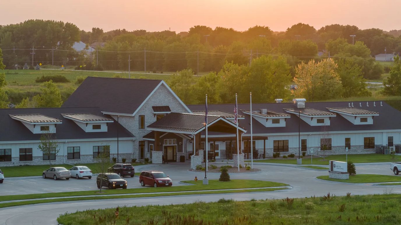 Exterior view of Tabitha at Prairie Commons during sunset