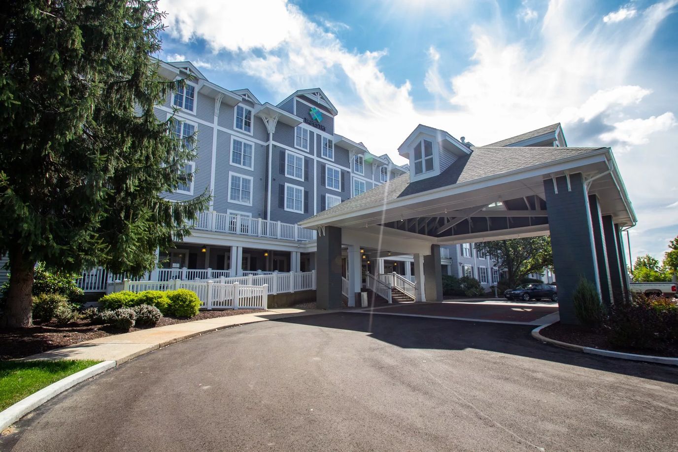 Exterior view of Tapestry Senior Living building entrance