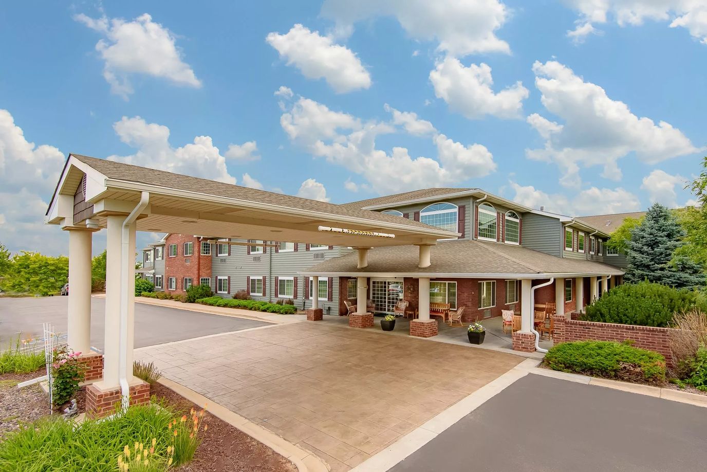 Exterior view of the facility entrance with a canopy