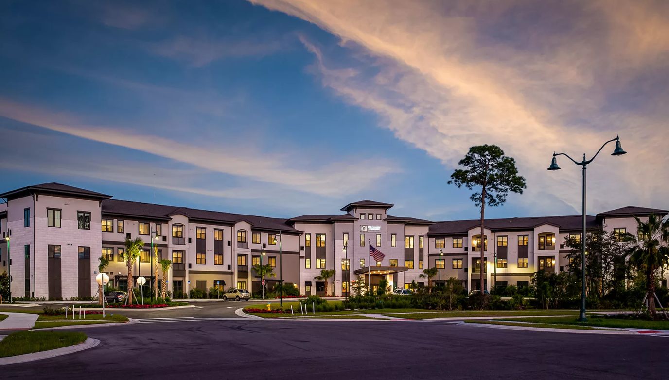 Exterior view of The Gallery at Port Orange during sunset