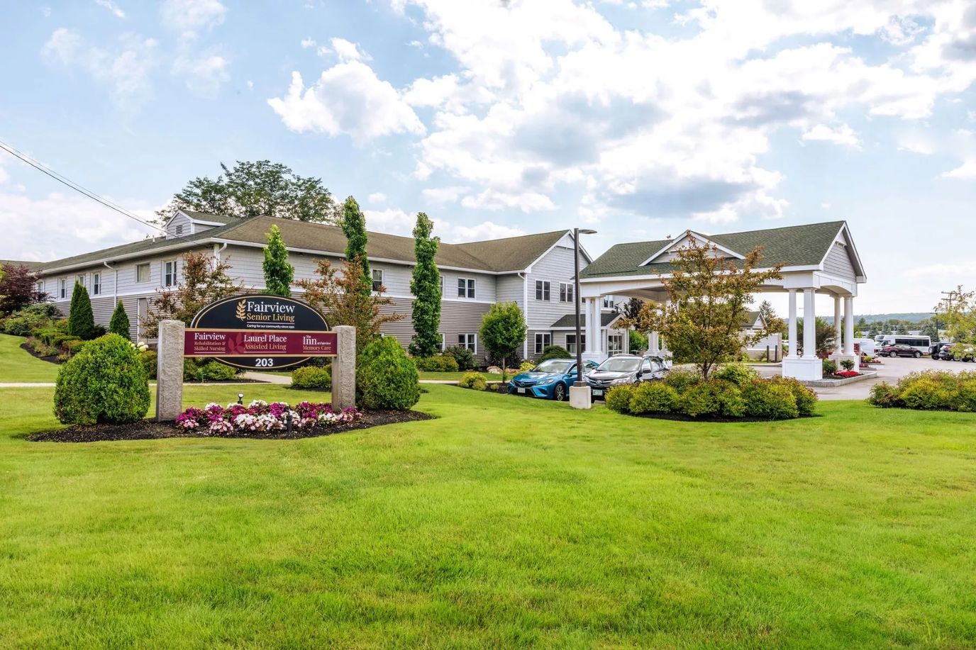 Exterior view of The Inn at Fairview with landscaped grounds