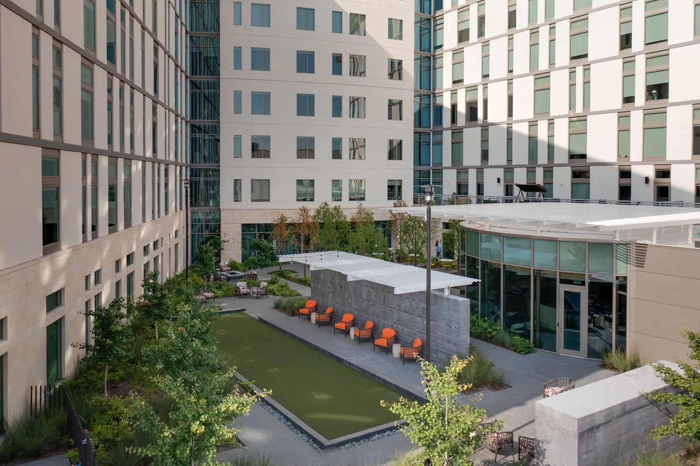 Outdoor space with seating and plants in a courtyard