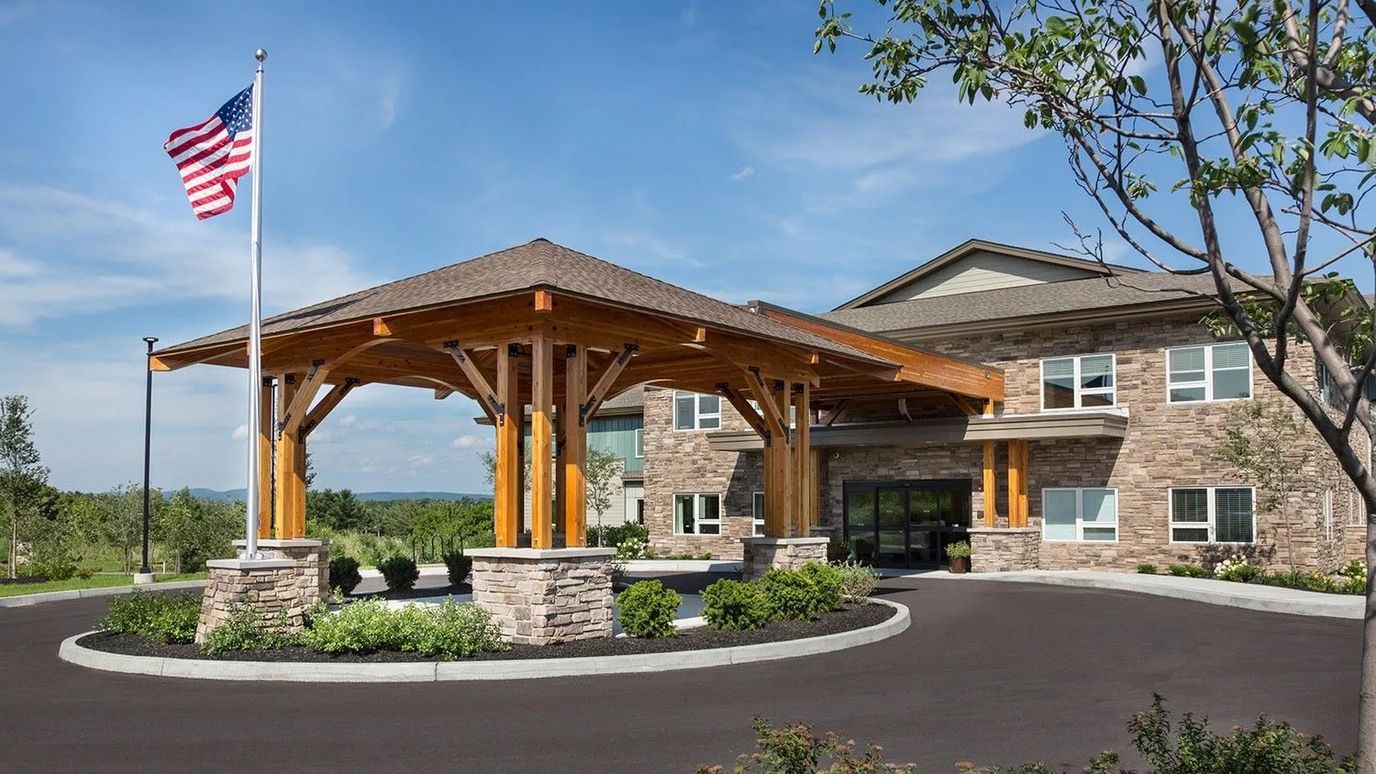 Front entrance of The Residence at Quarry Hill with porch