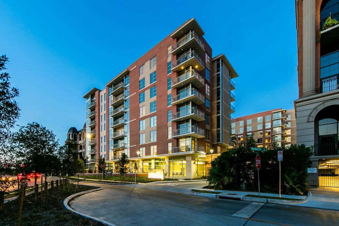 Exterior view of a modern assisted living facility at dusk