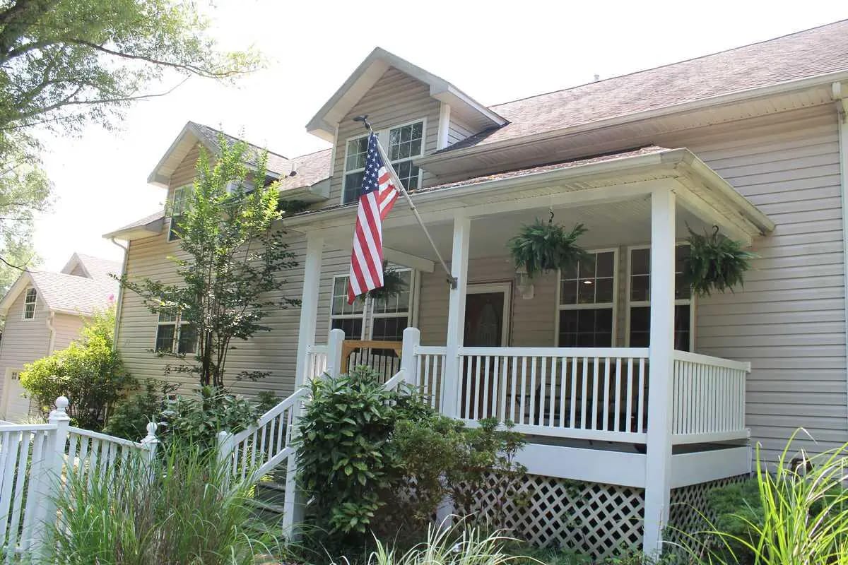 Exterior view of a charming residential building with a porch