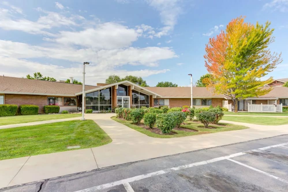 Exterior view of the facility with landscaped garden