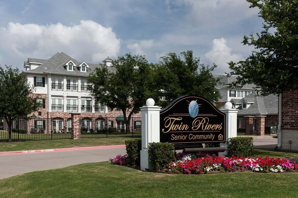 Exterior view of Twin Rivers Senior Community with landscaping