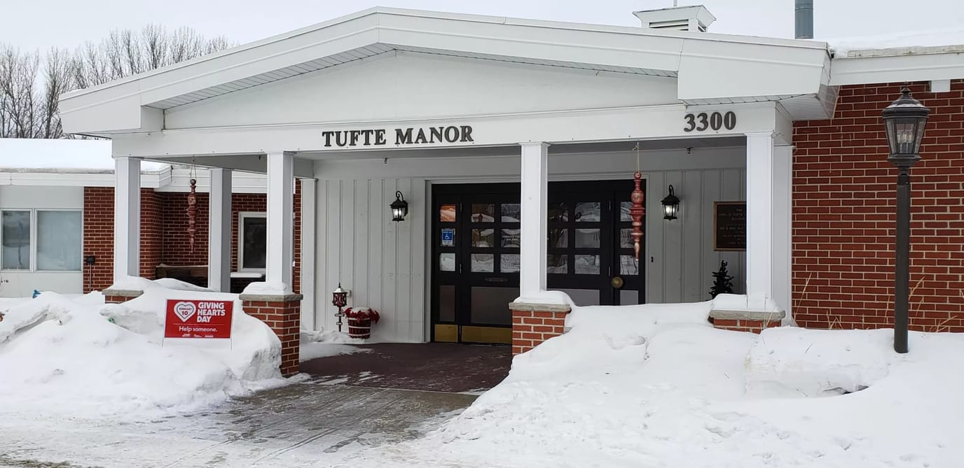 Entrance to Tufte Manor covered in snow